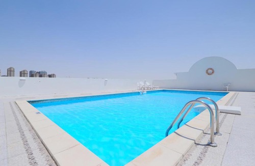 Dubai Production City Apartment | OYO Home 373 1BHK Qasr Sabah-1 IMPZ