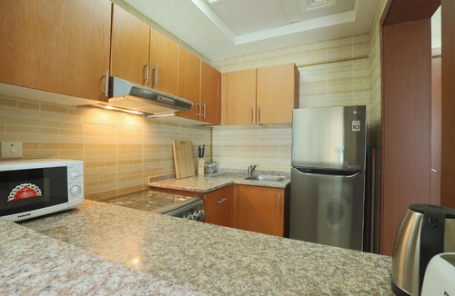 Dubai Production City Apartment | OYO Home 373 1BHK Qasr Sabah-1 IMPZ