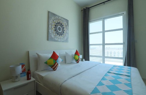 Dubai Production City Apartment | OYO Home 373 1BHK Qasr Sabah-1 IMPZ