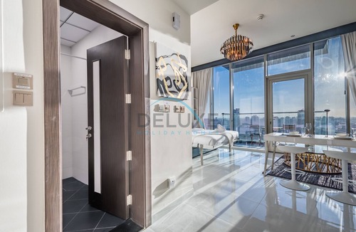 Motor City Apartment | Pleasing Studio Apartment in Miraclz Tower, Arjan-Dubailand by Deluxe Holiday Homes
