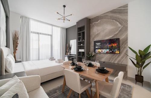 Dubai Apartment | Quiet Top-Floor Studio Near Metro with Free Baby Gear