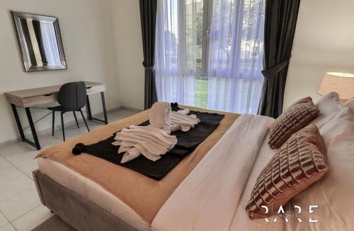 Discovery Gardens Apartment | Rare Holiday Homes - Near Metro - Garden View - Mogul Cluster - Building# 204 - RG09 - Discovery Gardens