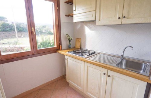 Baia Sant'Anna Apartment | Residence Baia Sant'Anna with swimming pool and two bathrooms BudoniRentals