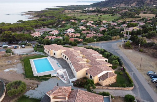 Baia Sant'Anna Apartment | Residence Baia Sant'Anna with swimming pool and two bathrooms BudoniRentals