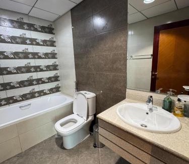 Rumailah Apartment | sand and beach haven at Ajman Corniche!