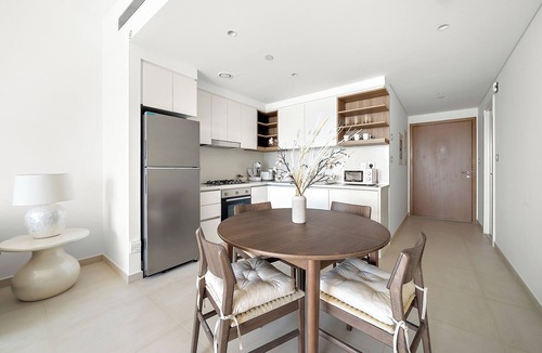 Trade Center Apartment | Serene 2BR w/Pool & Gym Access