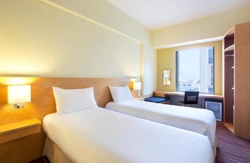 Al Muraqqabat Hotel | Standard Room Near Westzone Supermarket Rigga By Luxury Bookings