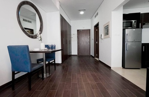 Dubai Sports City Apartment | StoneTree - The Matrix Studio Apartment in Sports City