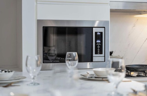Dubai Apartment | Stylish 1BR | City & Creek Views, Near Downtown Dining & Attractions