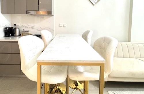 Nad Al Sheba Apartment | Stylish Pool View 1BR l Central Medyan Escape