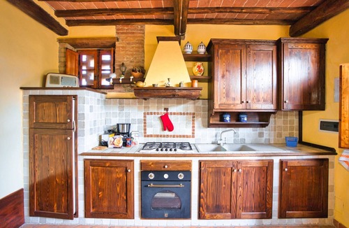 Montalcinello Other | This ground floor house (55 sqm) consists of a living room with fireplace, satellite tv and kitchen