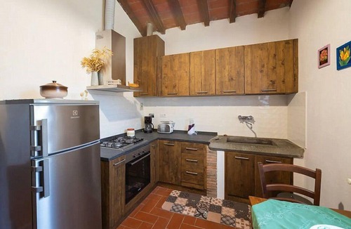 Loro Ciuffenna Villa | Villa del Nibbio: A characteristic and welcoming two-story age-old farm house located in an isolated position, on the slopes of a hill which is covered with olive groves, with Free WI-FI.
