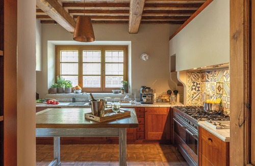 Passignano sul Trasimeno Villa | Villa with large pool that blends with the lines of the lake Trasimeno