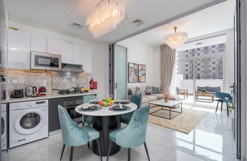 Discovery Gardens Apartment | Vogue Elegance at Pearlz near Metro