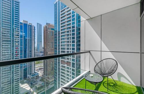 Dubai Production City Apartment | Waves- Cozy 1BR Lakefront Stay in JLT