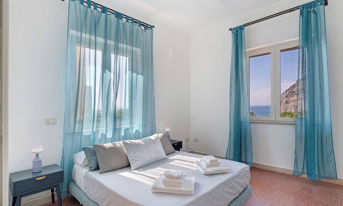 Meta Apartment | Apartment 'Ebbrezza Di Mare' with Sea View, Private Terrace and Air Conditioning