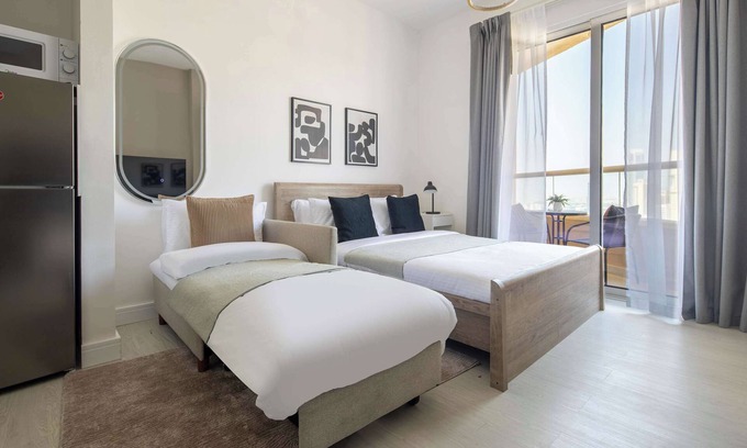 Dubai Production City Apartment | Contemporary Studio in IMPZ with Lake Views