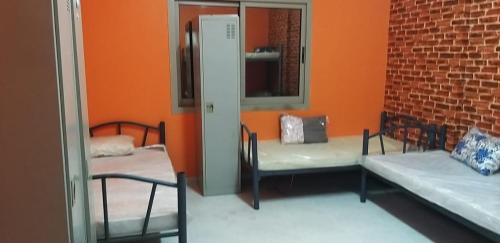 Al Qasimia Hostel | Executive Sharing Bed With Other Male Guests