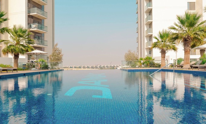 Dubai Apartment | KeyRock Golf Gate - Relax with Pool