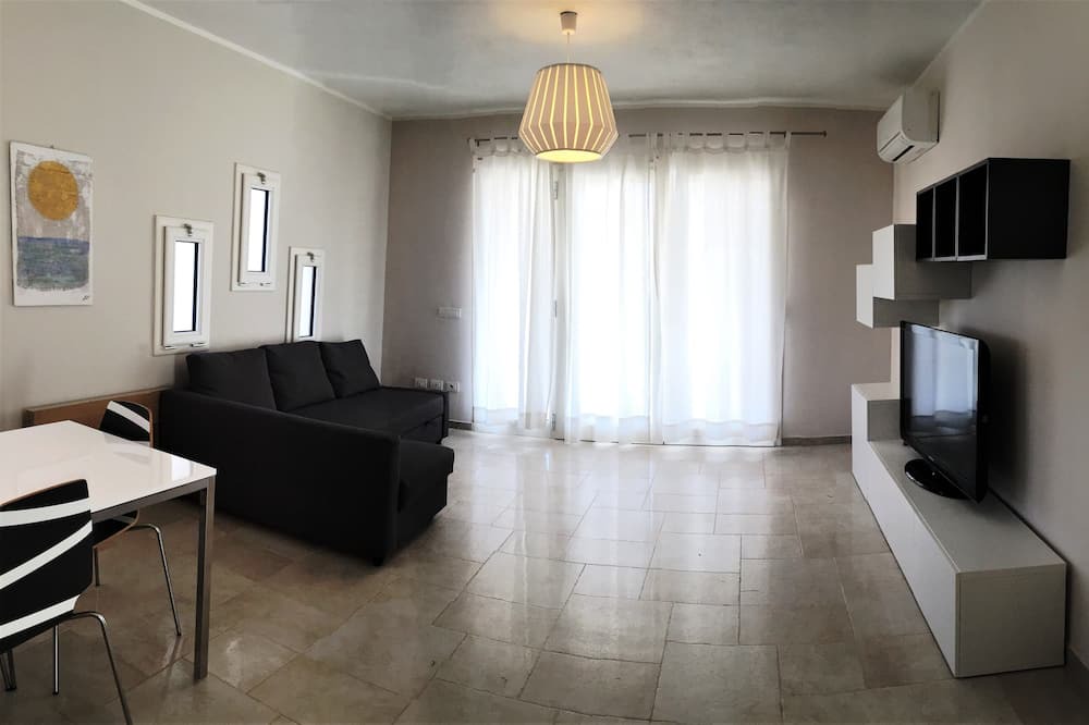 Photo of Livingroom in Case Peschiera-Lu Fraili