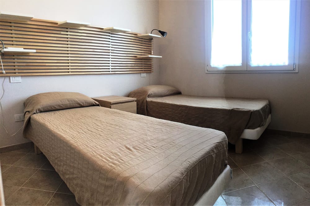 Photo of Bedroom in Case Peschiera-Lu Fraili