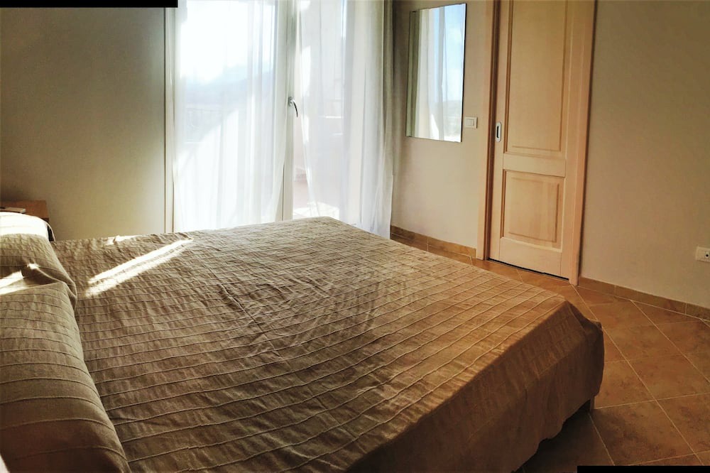 Photo of Bedroom in Case Peschiera-Lu Fraili