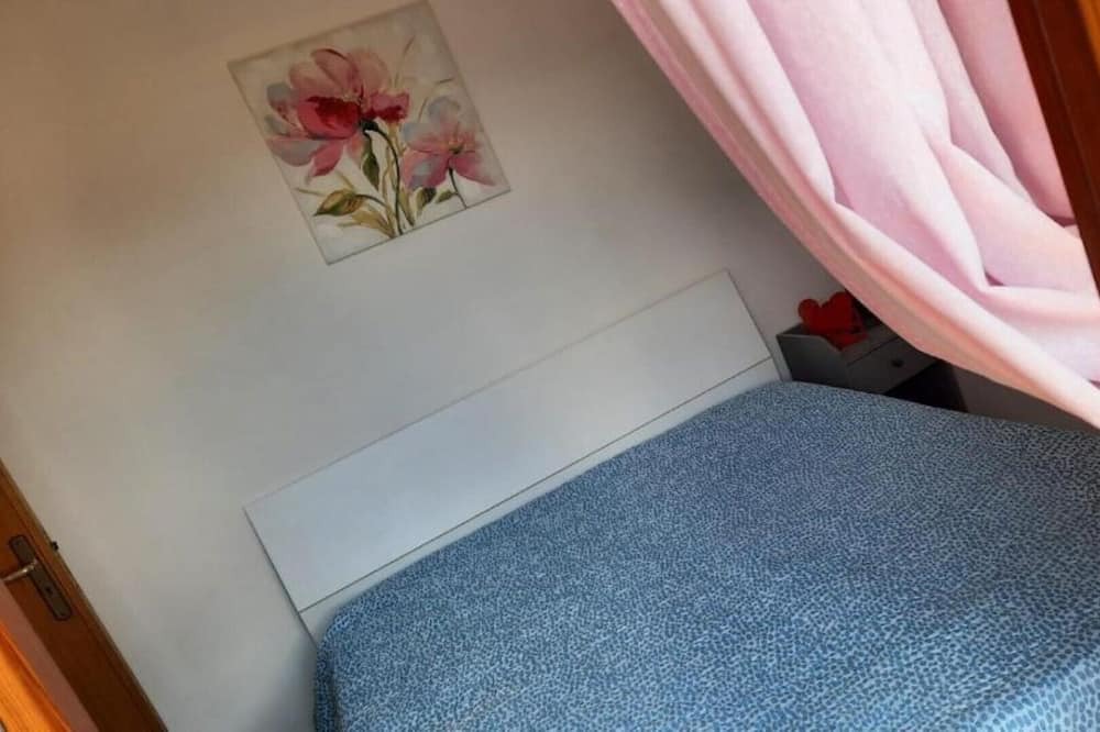 Photo of Bedroom in Piazza-Tralia-Pendolo