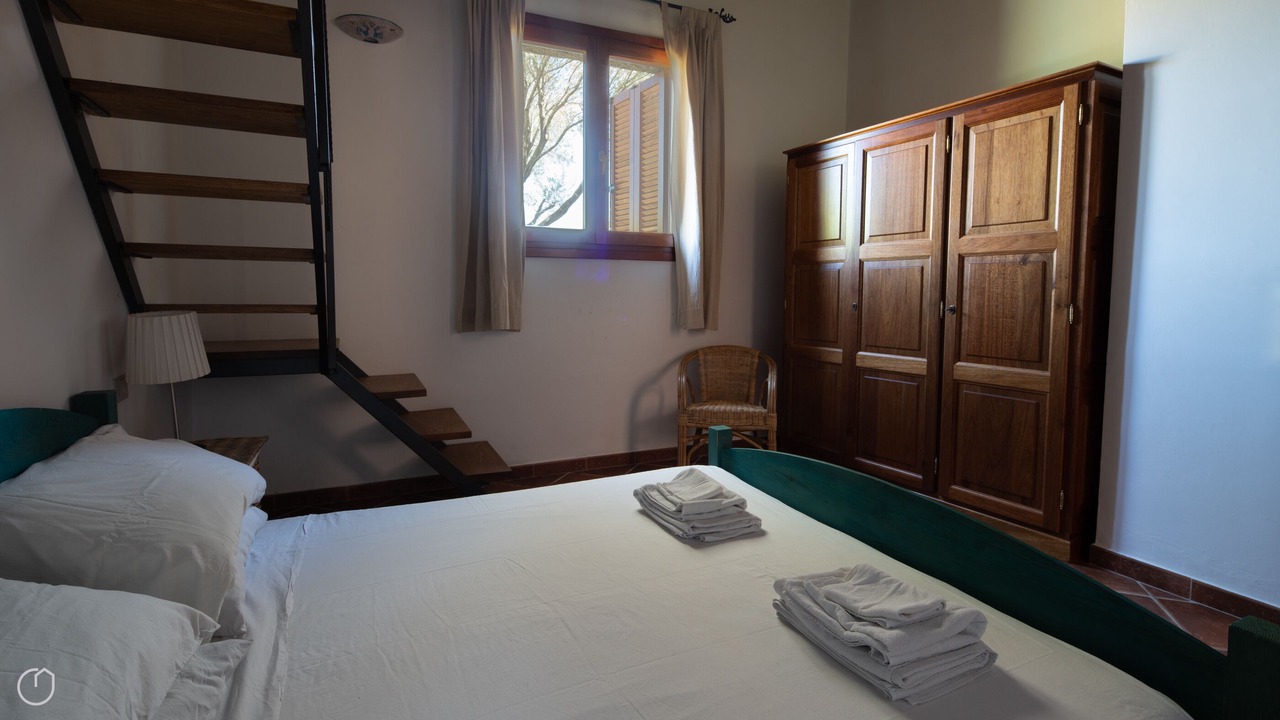 Photo of Bedroom in Case Peschiera-Lu Fraili