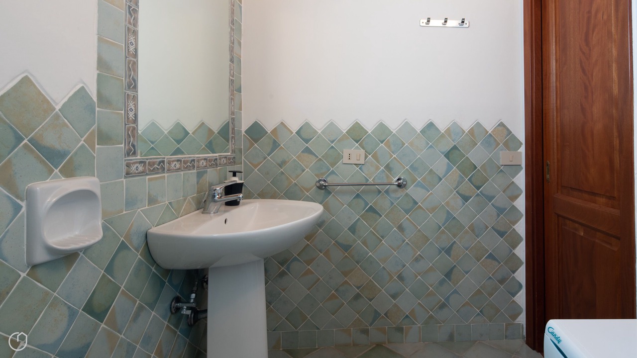 Photo of Bathroom in Case Peschiera-Lu Fraili