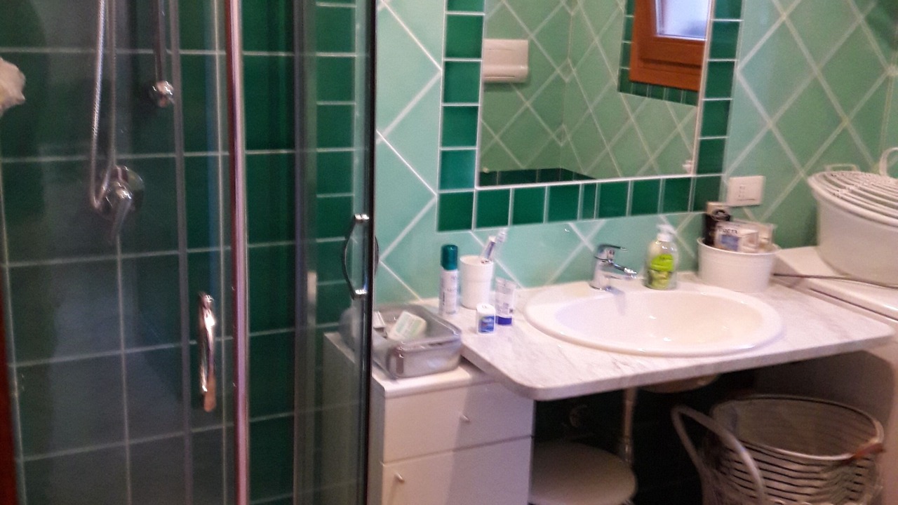 Photo of Bathroom in Case Peschiera-Lu Fraili