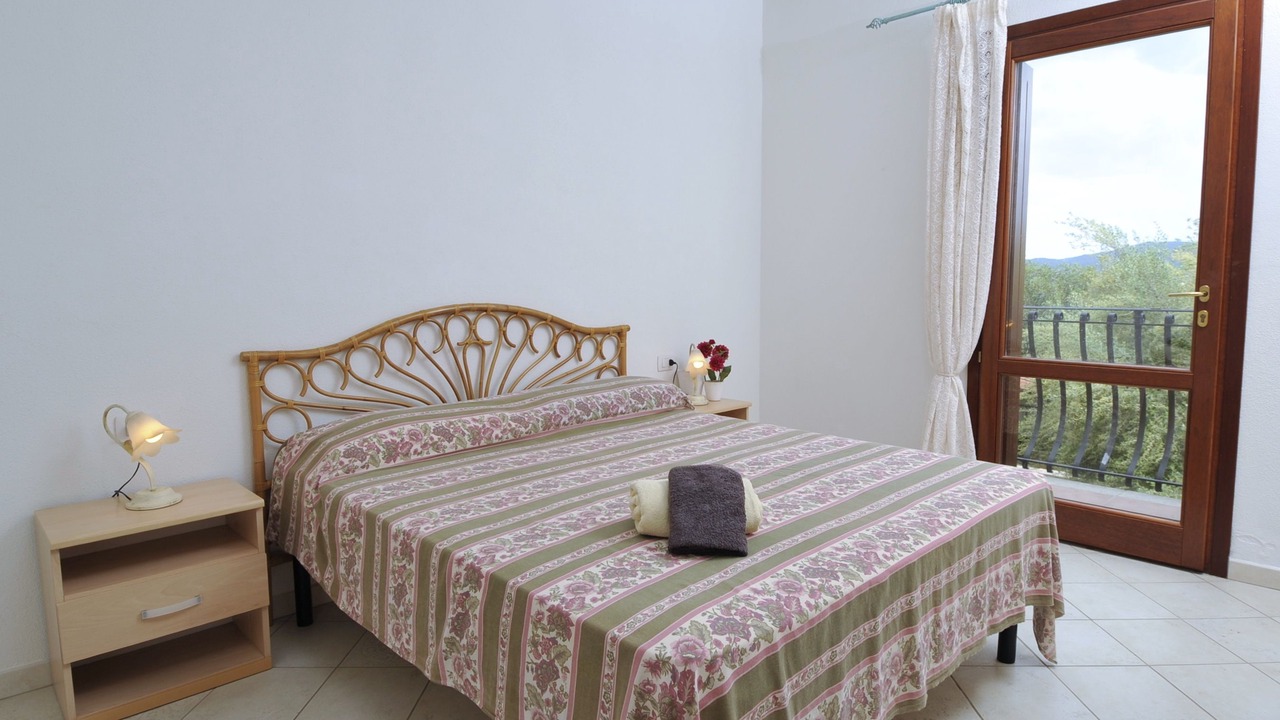 Photo of Bedroom in Case Peschiera-Lu Fraili