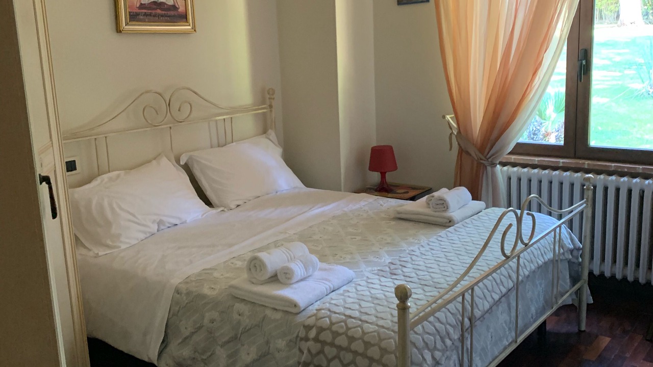 Photo of Bedroom in Badia al Pino