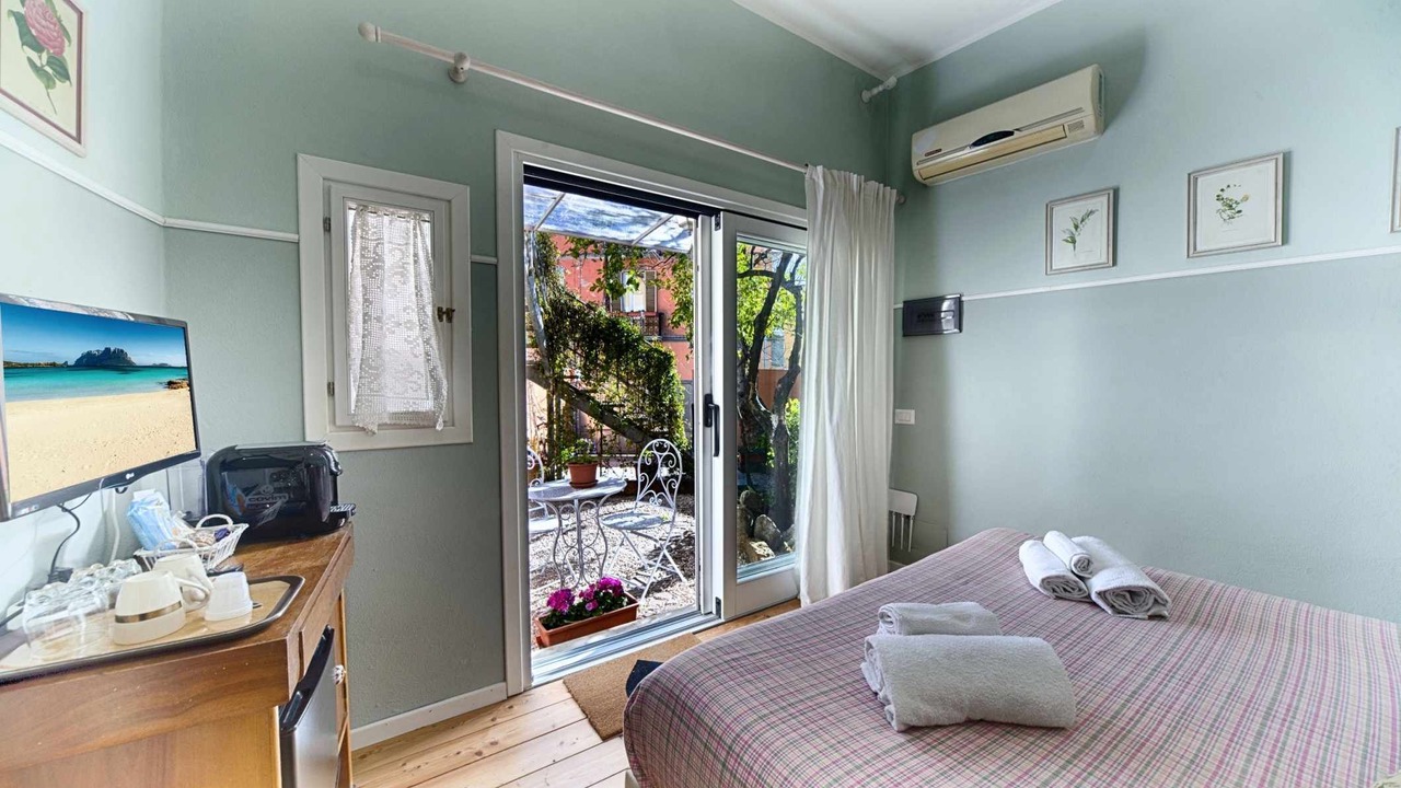 Photo of Bedroom in Olbia City Centre