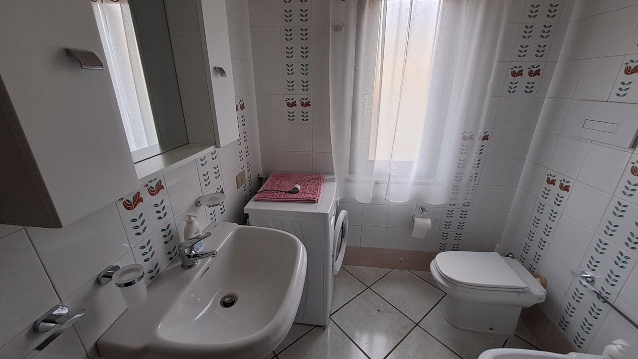 Photo of Bathroom in Case Peschiera-Lu Fraili