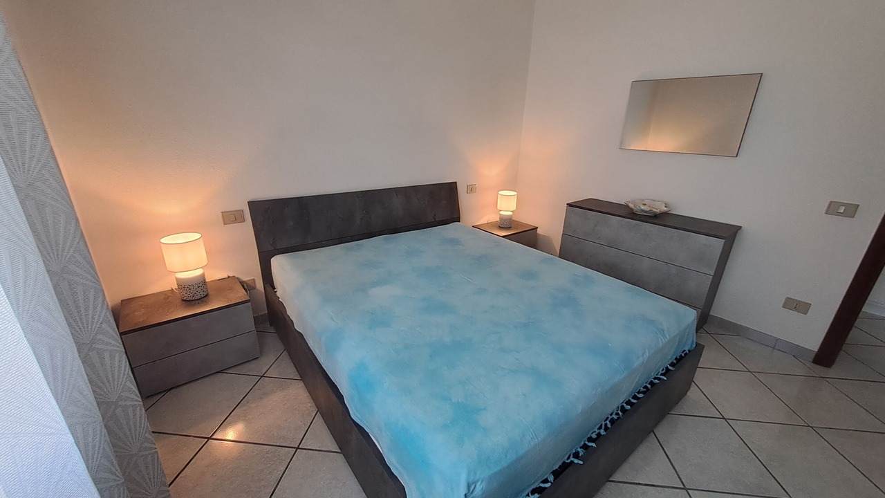 Photo of Bedroom in Case Peschiera-Lu Fraili