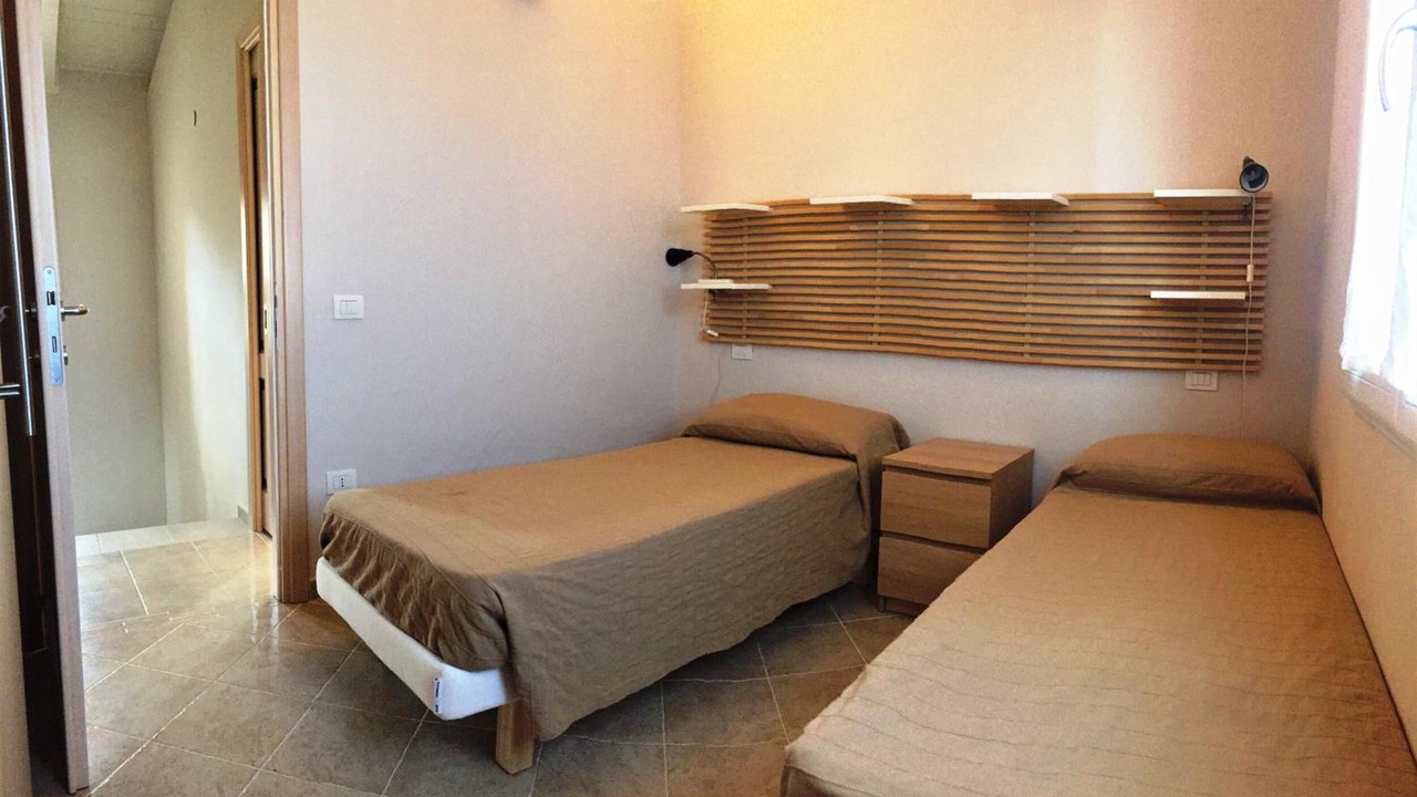 Photo of Bedroom in Case Peschiera-Lu Fraili