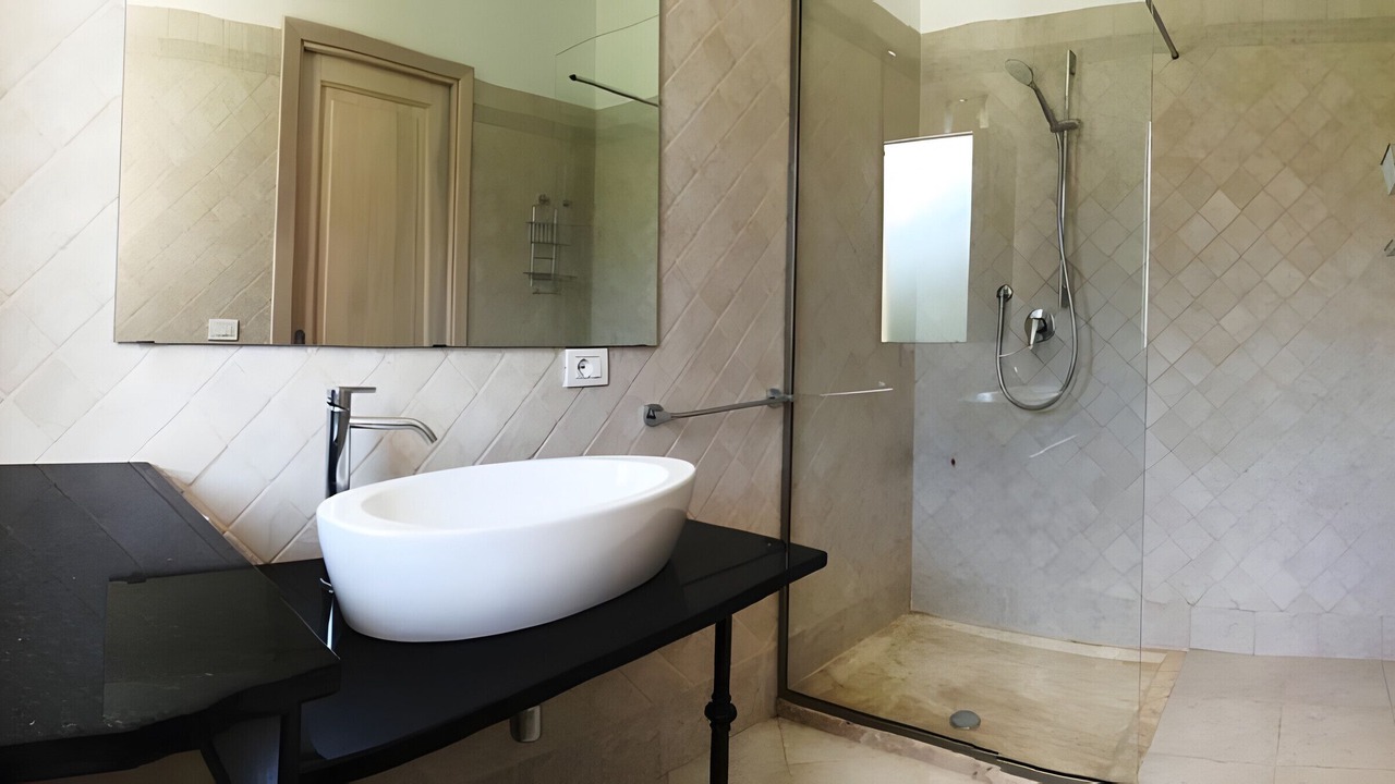 Photo of Bathroom in Case Peschiera-Lu Fraili