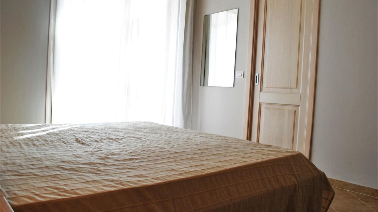 Photo of Bedroom in Case Peschiera-Lu Fraili