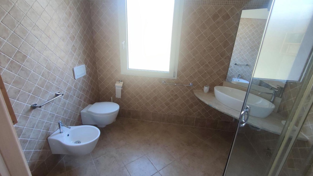 Photo of Bathroom in Case Peschiera-Lu Fraili