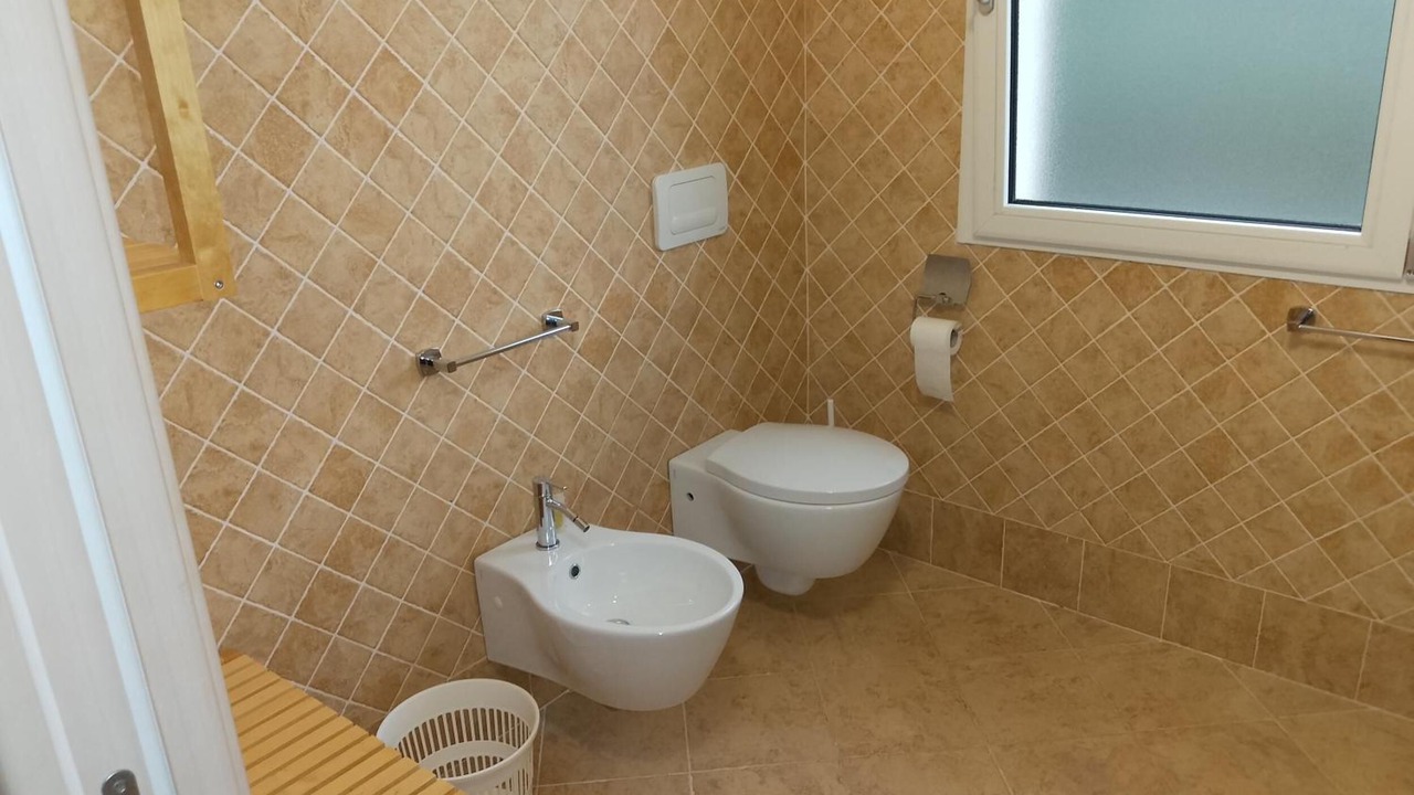 Photo of Bathroom in Case Peschiera-Lu Fraili