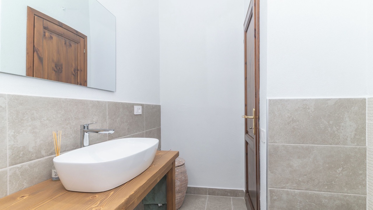 Photo of Bathroom in Case Peschiera-Lu Fraili