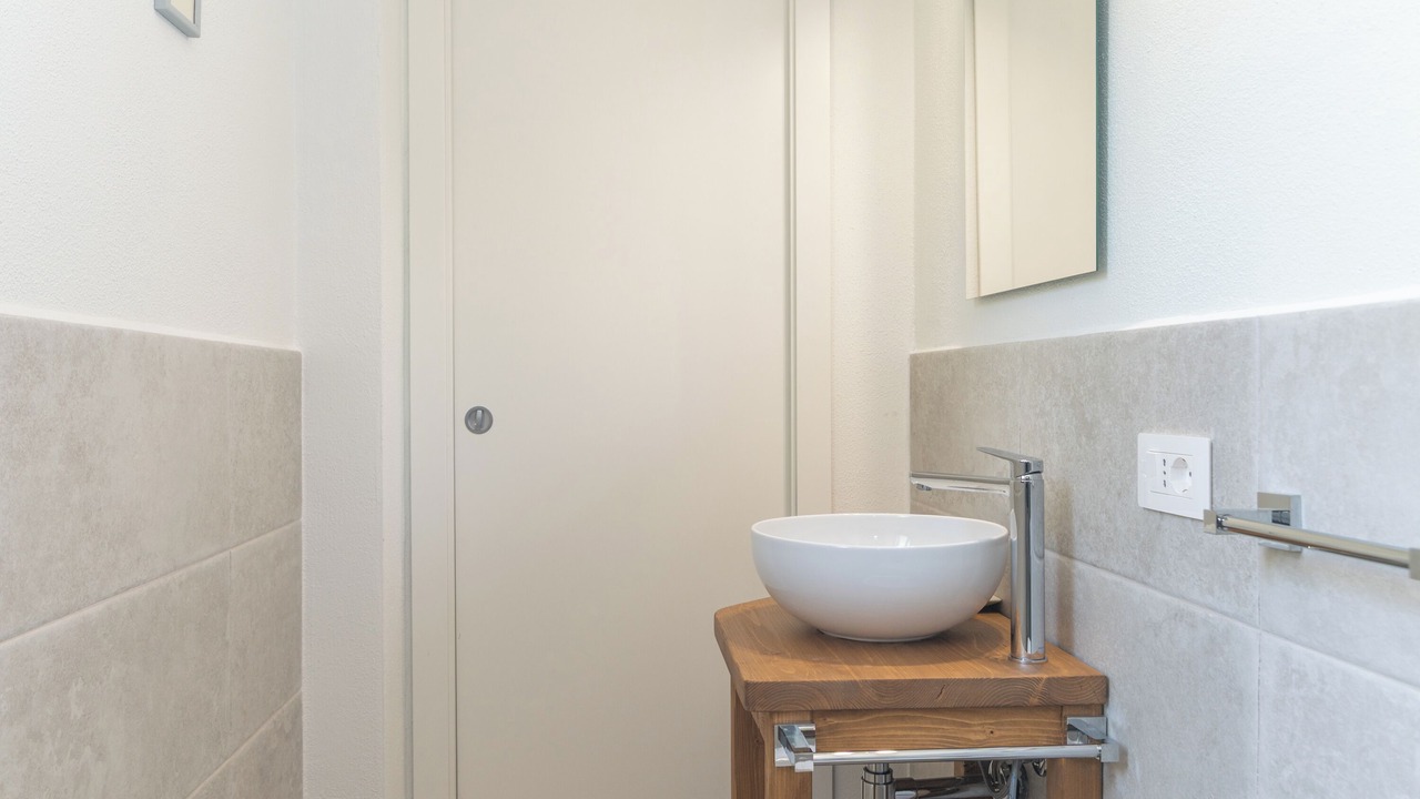 Photo of Bathroom in Case Peschiera-Lu Fraili