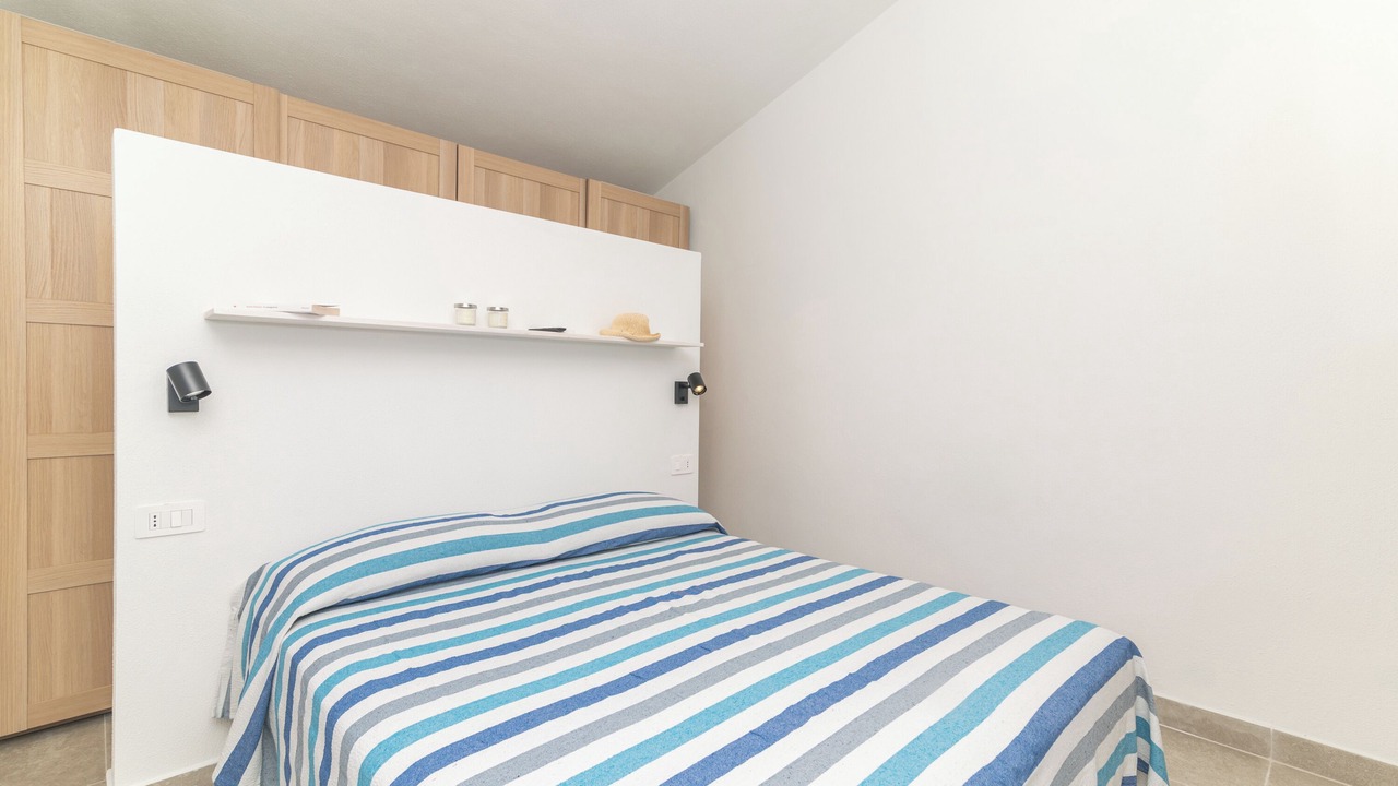 Photo of Bedroom in Case Peschiera-Lu Fraili