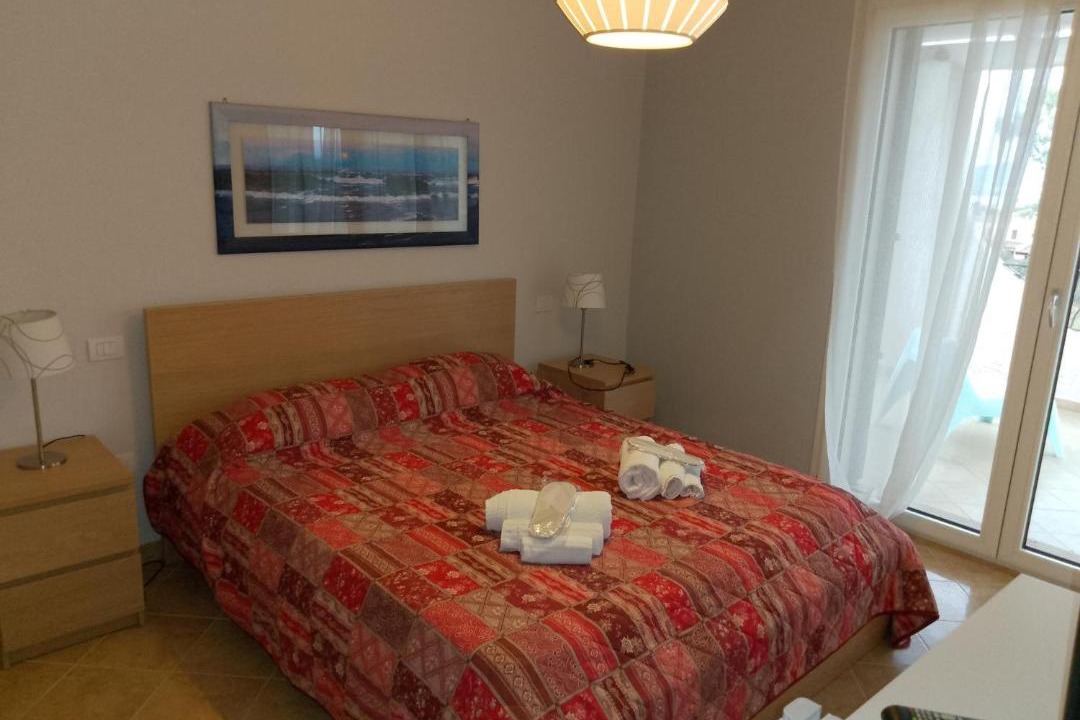 Photo of Bedroom in Case Peschiera-Lu Fraili