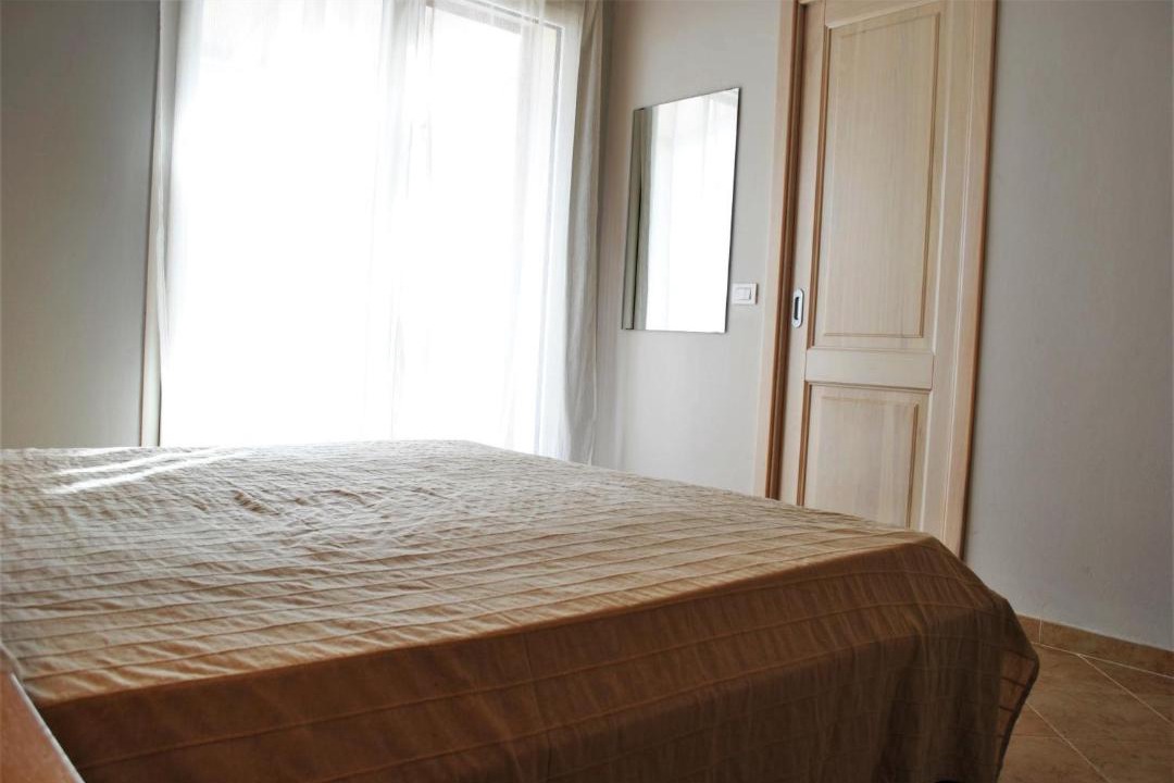 Photo of Bedroom in Case Peschiera-Lu Fraili