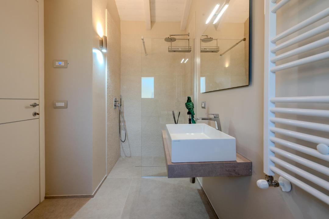Photo of Bathroom in Case Peschiera-Lu Fraili