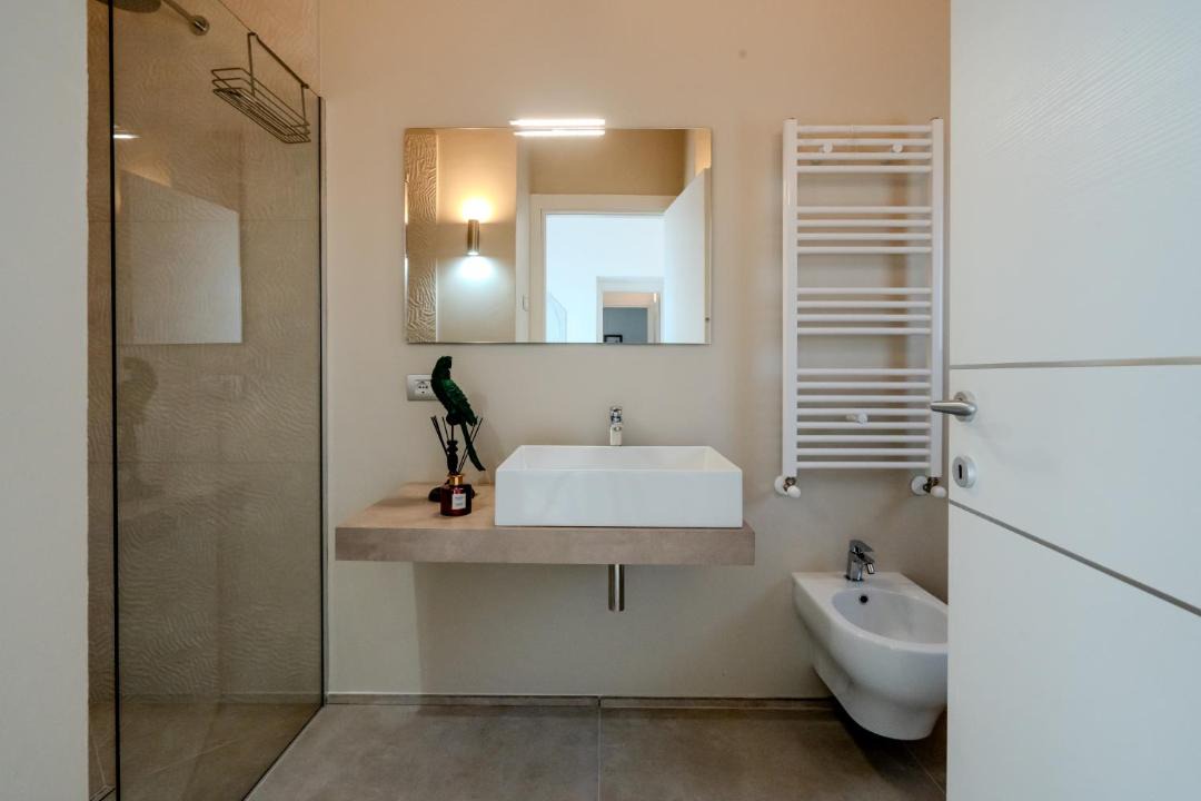 Photo of Bathroom in Case Peschiera-Lu Fraili