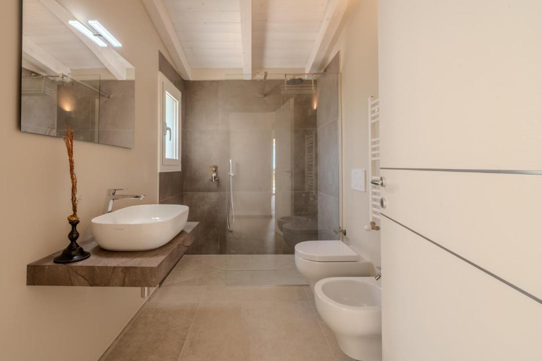 Photo of Bathroom in Case Peschiera-Lu Fraili