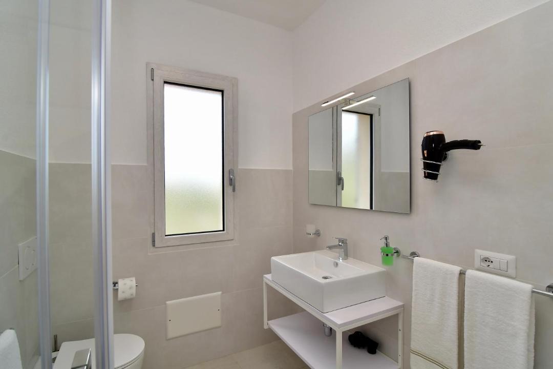 Photo of Bathroom in Case Peschiera-Lu Fraili