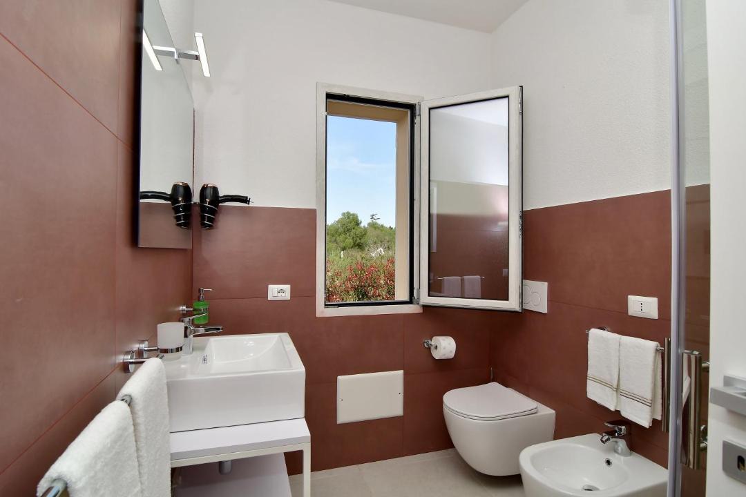 Photo of Bathroom in Case Peschiera-Lu Fraili